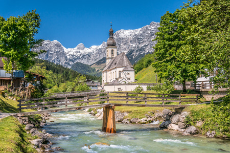 Scenic mountain landscape in the Bavarian Alps with famous Parish Church of St. Sebastian in the village of Ramsau, Nationalpark Berchtesgadener Land, Upper Bavaria, Germanyの写真素材
