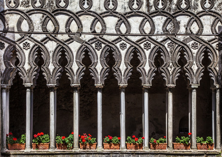 Beautiful view of famous cloister columns of Villa Rufolo in Ravello, Amalfi Coast, Campania, Italyの写真素材