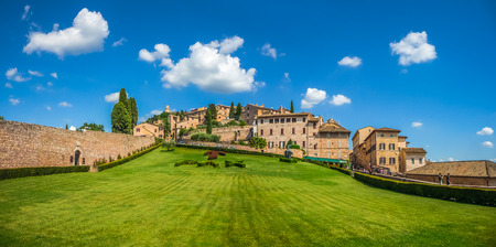 Beautiful panoramic view of peaceful gardens of famous Basilica of St. Francis of Assisi Basilica Papale di San Francesco in Assisi, Umbria, Italyの写真素材