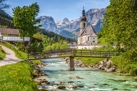 Scenic mountain landscape in the Bavarian Alps with famous Parish Church of St. Sebastian in the village of Ramsau, Nationalpark Berchtesgadener Land, Upper Bavaria, Germanyの写真素材
