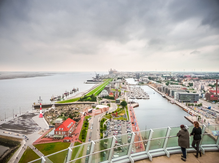 Beautiful panoramic view of famous Havenwelten from top of ATLANTIC Hotel SAIL City with Weser-Deich in the hanseatic city of Bremerhaven, Bremen, Germanyの写真素材