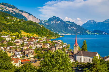 Beautiful mountain scenery with the town of Weggis at the northern shore of Lake Lucerne in beautiful evening light at sunset, Canton of Lucerne, central Switzerlandの写真素材