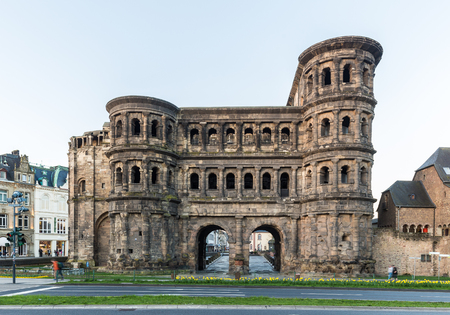 Classic view of famous Porta Nigra, the largest Roman city gate monument north of the Alps, in beautiful post sunset twilight at dusk in summer, Rheinland-Pfalz, Germanyのeditorial素材