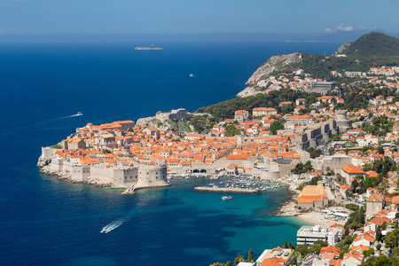 Panoramic aerial view of the historic town of Dubrovnik, one of the most famous tourist destinations in the Mediterranean Sea, from Srt mountain on a beautiful sunny day in summer, Dalmatia, Croatiaの写真素材