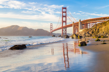 Classic panoramic view of famous Golden Gate Bridge seen from scenic Baker Beachの写真素材