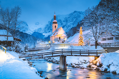 Beautiful twilight view of Sankt Sebastian pilgrimage church with decorated Christmas tree illuminatedの写真素材