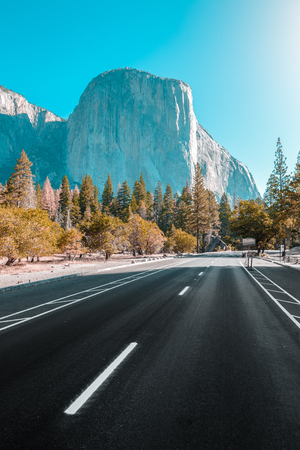 Famous El Capitan mountain peak with road running through Yosemite Valleyの写真素材