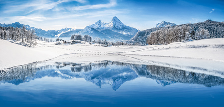 Panoramic view of beautiful white winter wonderland sceneryの写真素材