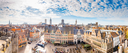 Aerial panoramic view of the historic city of Ghent with famous medieval Gravensteen Castle on a beautiful sunny day with blue sky and clouds in summer, province of East Flanders, Belgium