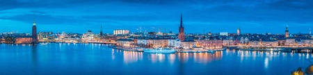 Panoramic view of famous Stockholm city center with historic Riddarholmen in Gamla Stan old town  and Stockholms Stadshuset district at dusk, Sodermalm, central Stockholm, Swedenの写真素材