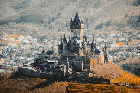 Beautiful aerial view of the historic town of Cochem with famous Reichsburg castle on top of a hill on a sunny day with blue sky in spring, Rheinland-Pfalz, Germanyのeditorial素材