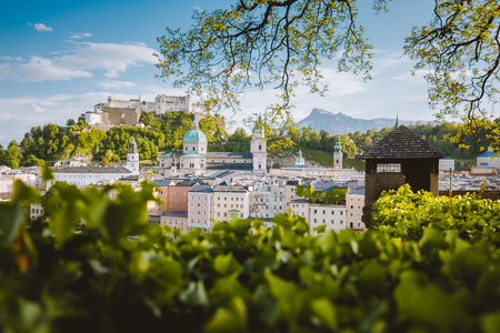 Classic panorama view of the old town of Salzburg, a UNESCO World Heritage Site since 1997, on a beautiful sunny day with blue sky in summer, Austriaの写真素材