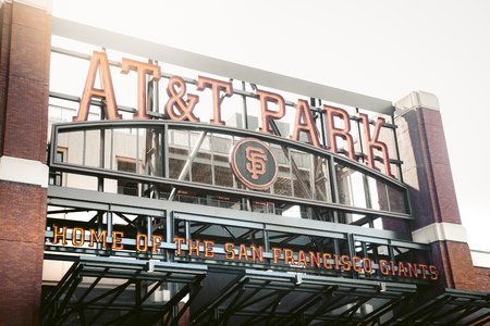Panorama view of historic AT&T Park baseball park, home of the San Francisco Giants professional baseball franchise, on a beautiful sunny day with blue sky in summer, San Francisco, California, USAの写真素材