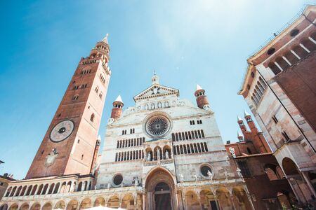 Ancient Cathedral of Cremona with famous Torrazzo bell tower and baptistery in Cremona, Lombardy, Italyの写真素材