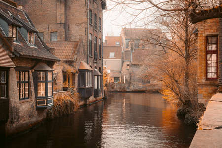 Scenic view of the historic city center of Brugge in beautiful golden morning light at sunrise, province of West Flanders, Belgiumのeditorial素材