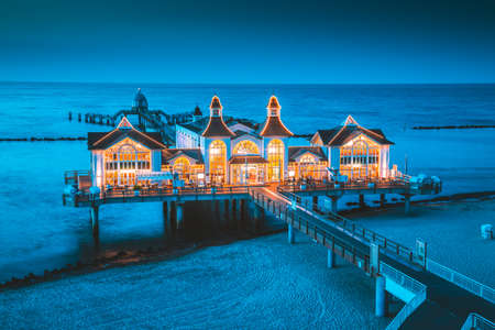 Famous Sellin Seebruecke (Sellin Pier) in beautiful evening twilight at dusk #in summer, Ostseebad Sellin tourist resort, Baltic Sea region, Germanyのeditorial素材