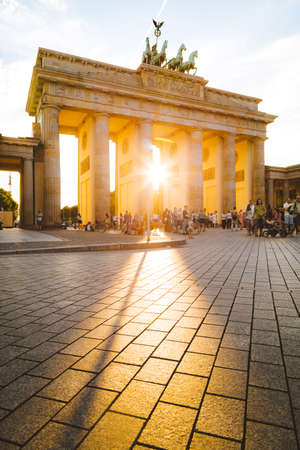 Brandenburg Gate, one of the best-known landmarks and national symbols of Germany, in beautiful golden evening light, Berlin, Germany.のeditorial素材