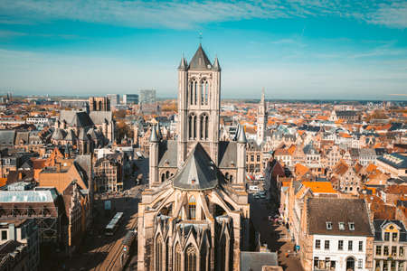 Aerial panoramic view of the historic city of Ghent on a beautiful sunny day with blue sky and clouds in summer, province of East Flanders, Belgiumのeditorial素材
