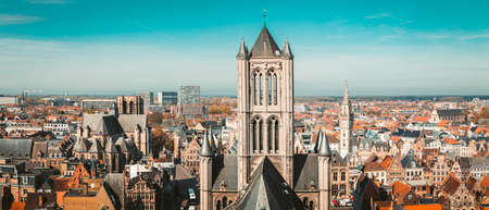 Aerial panoramic view of the historic city of Ghent on a beautiful sunny day with blue sky and clouds in summer, province of East Flanders, Belgiumのeditorial素材