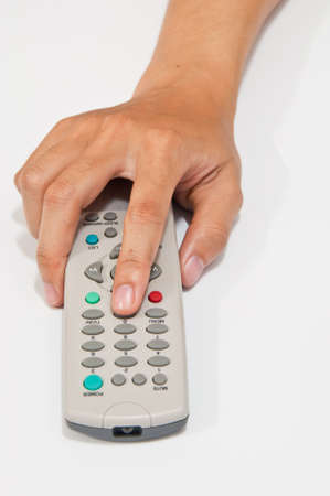 Hand was pressing the remote buttonの写真素材