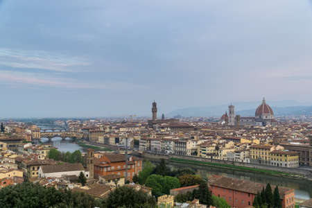 Panorama of the Italian city Florence with the golden bridge and the Duomo cathedralの写真素材