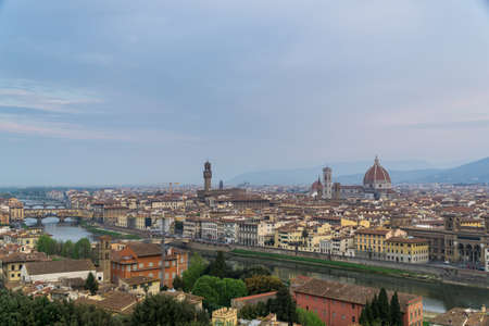 Panorama of the Italian city Florence with the golden bridge and the Duomo cathedralの写真素材