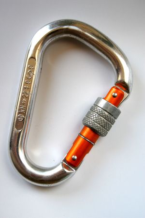 Climbing carabiner isolated over whiteの写真素材