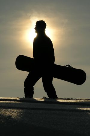 Silhouette of a snowboarderの写真素材