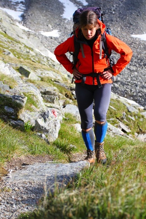 Young woman trekking in the Austrian Alpsの写真素材