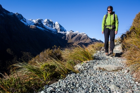 Young woman on a mountain hikeの写真素材