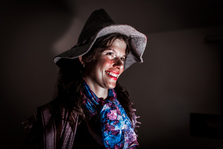 Young woman dressed in fancy-dress as a witchの写真素材