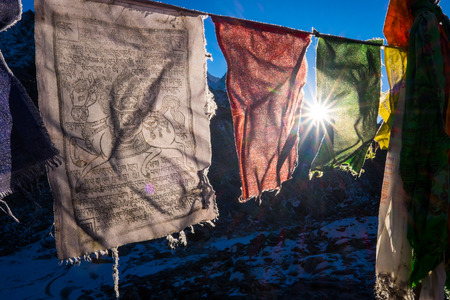 Base camp with prayer flags in high Himalayas, Nepalの写真素材