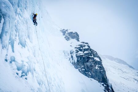 Climber ascending the icefallの写真素材