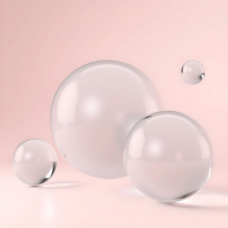 3d rendering of white glass balls on a pastel pink backgroundの素材