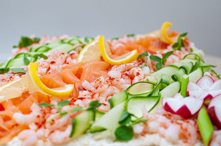 SmÃ¶rgÃ¥stÃ¥rta, Swedish sandwich like cake or sandwich torte is a dish with seafood...