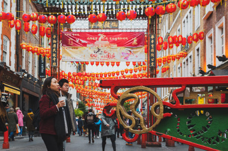 11/09/2019. London, UK. Red lanterns decorating streets and passages in Chinatown district in Soho.のeditorial素材