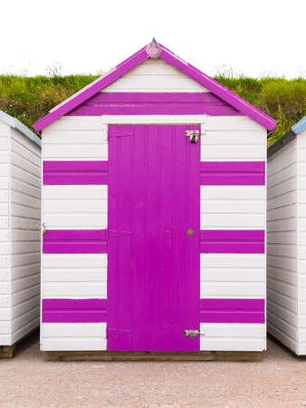 Colourful beach houses. Row of multicolored beach huts against blue sky.の写真素材