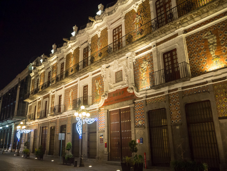 Puebla, Mexico, South America - January 2018: [Town of Puebla at night, street and church decorated with lights]のeditorial素材