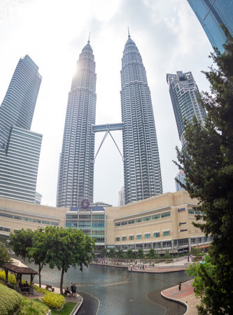 Kuala Lumpur, Malaysia : Petronas Twin Towers with bridge, modern architecture and capital city...