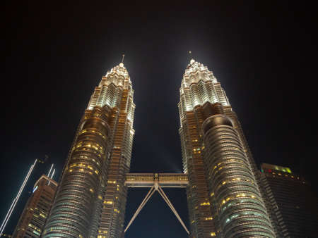 Kuala Lumpur, Malaysia : Petronas Twin Towers with bridge, modern architecture and capital city panorama tourist destinationのeditorial素材