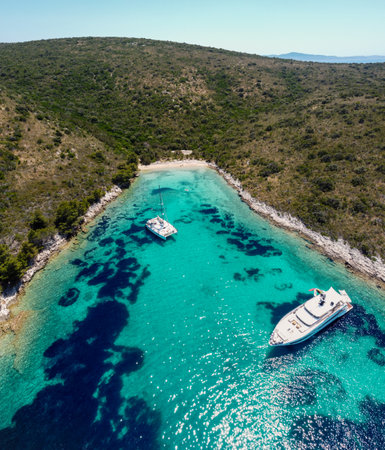 Beach rocky coast of Croatia island, Mediterranean sea national park. Yachting and sailing tourist holiday.の写真素材