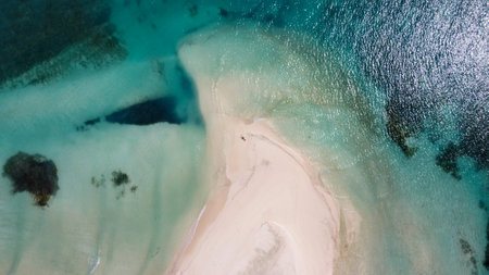 Maldives resort island drone aerial view, Indian ocean atoll nature beach and palm forest, leisure tourist luxury vacationの写真素材