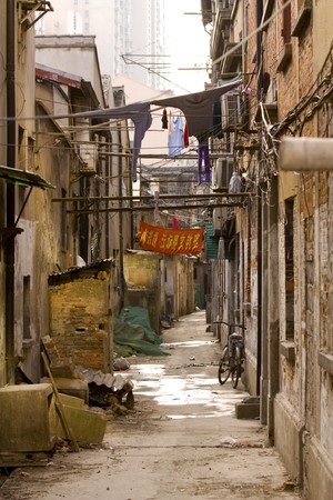 Scene of a locals street in Shanghai where the real Chinese people have to liveの写真素材