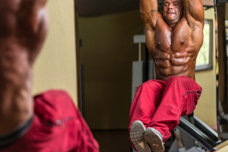 body builder doing abs exerciseの写真素材