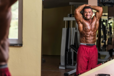 body builder showing absの写真素材