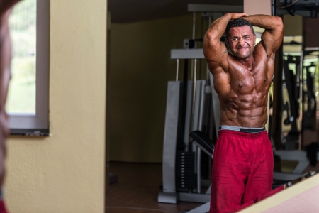 body builder showing absの写真素材