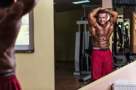 body builder showing absの写真素材