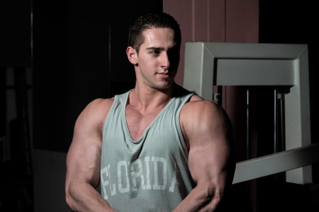 young bodybuilder showing his upper bodyの写真素材