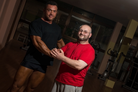 handshake of bodybuilder and training partnerの写真素材