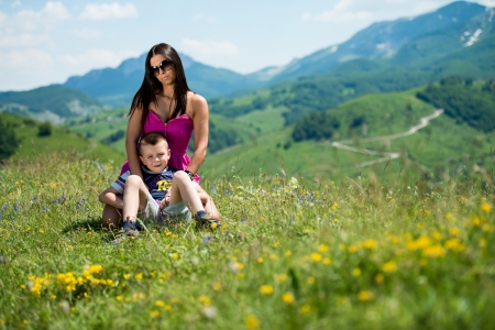mother and son sitting and playingの写真素材
